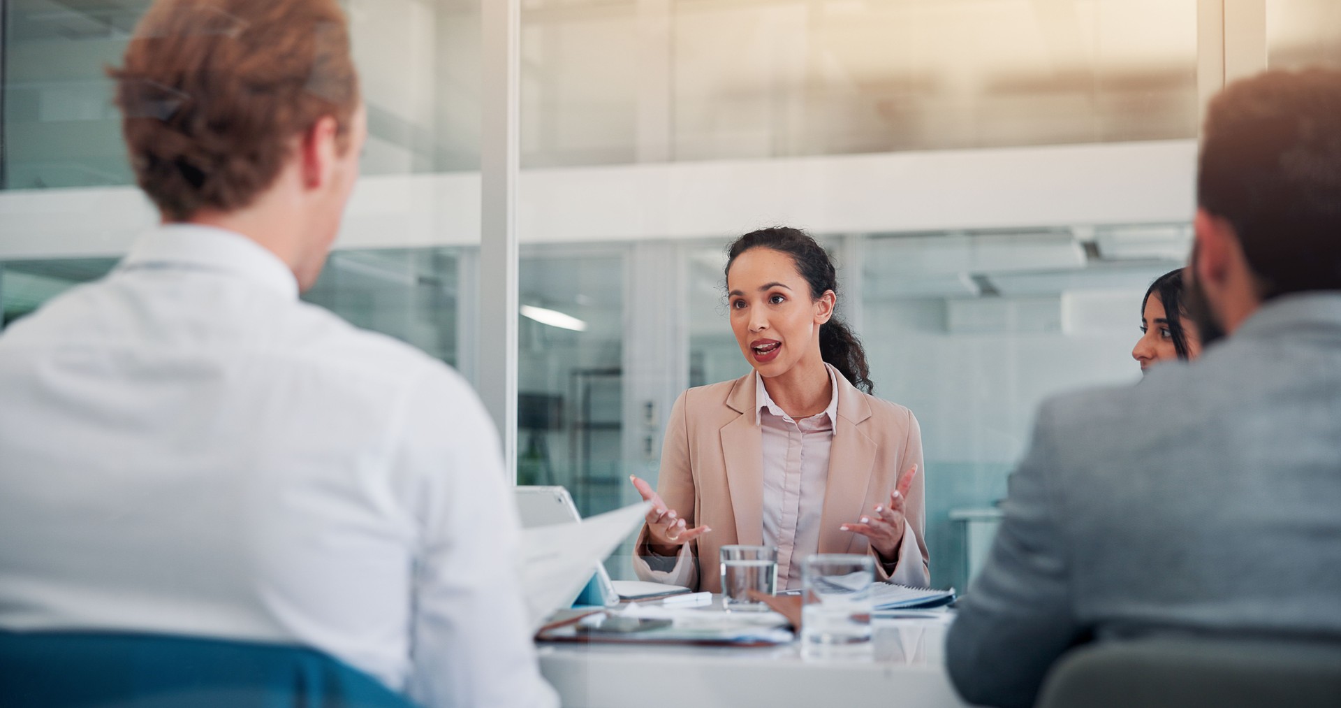 Discussion, teamwork and business people in office with finance negotiation, deal or proposal. Happy, meeting and financial managers with clients for investment account in collaboration in workplace.