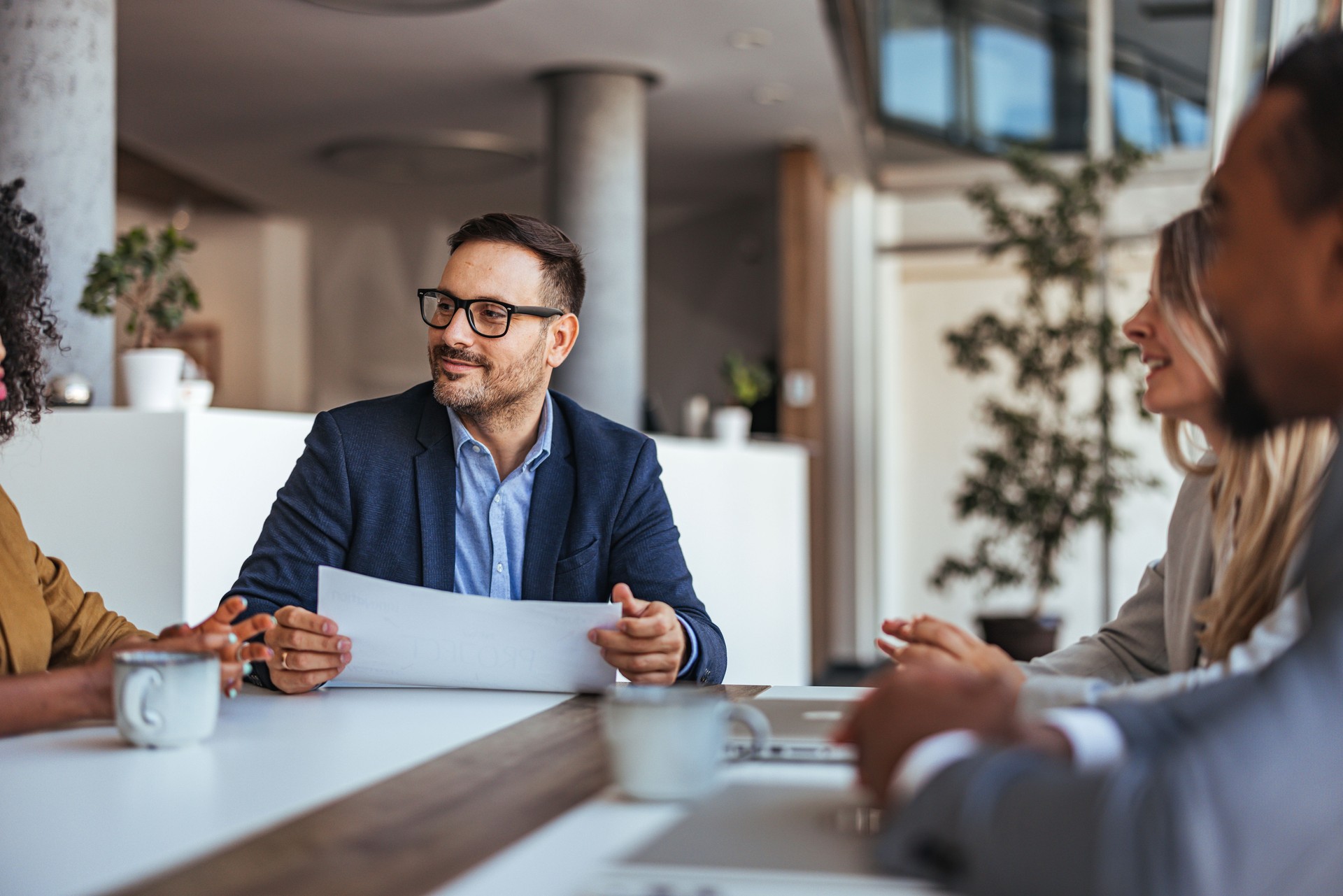 Business Meeting with Happy Team in Modern Office Setting